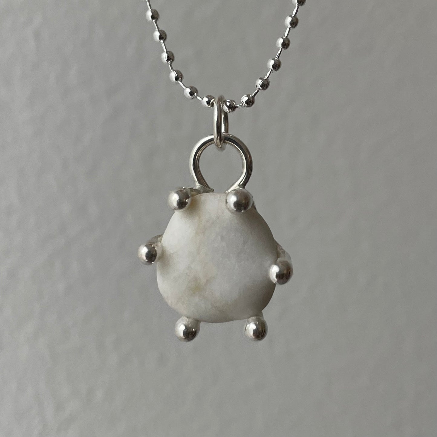 white pebble pendant