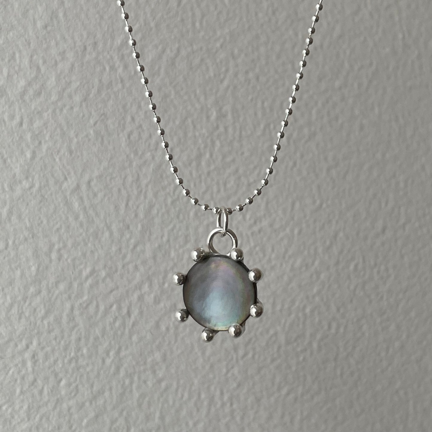 pearl button pendant