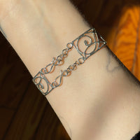 Spiral-panel bracelet
