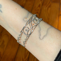 Spiral-panel bracelet